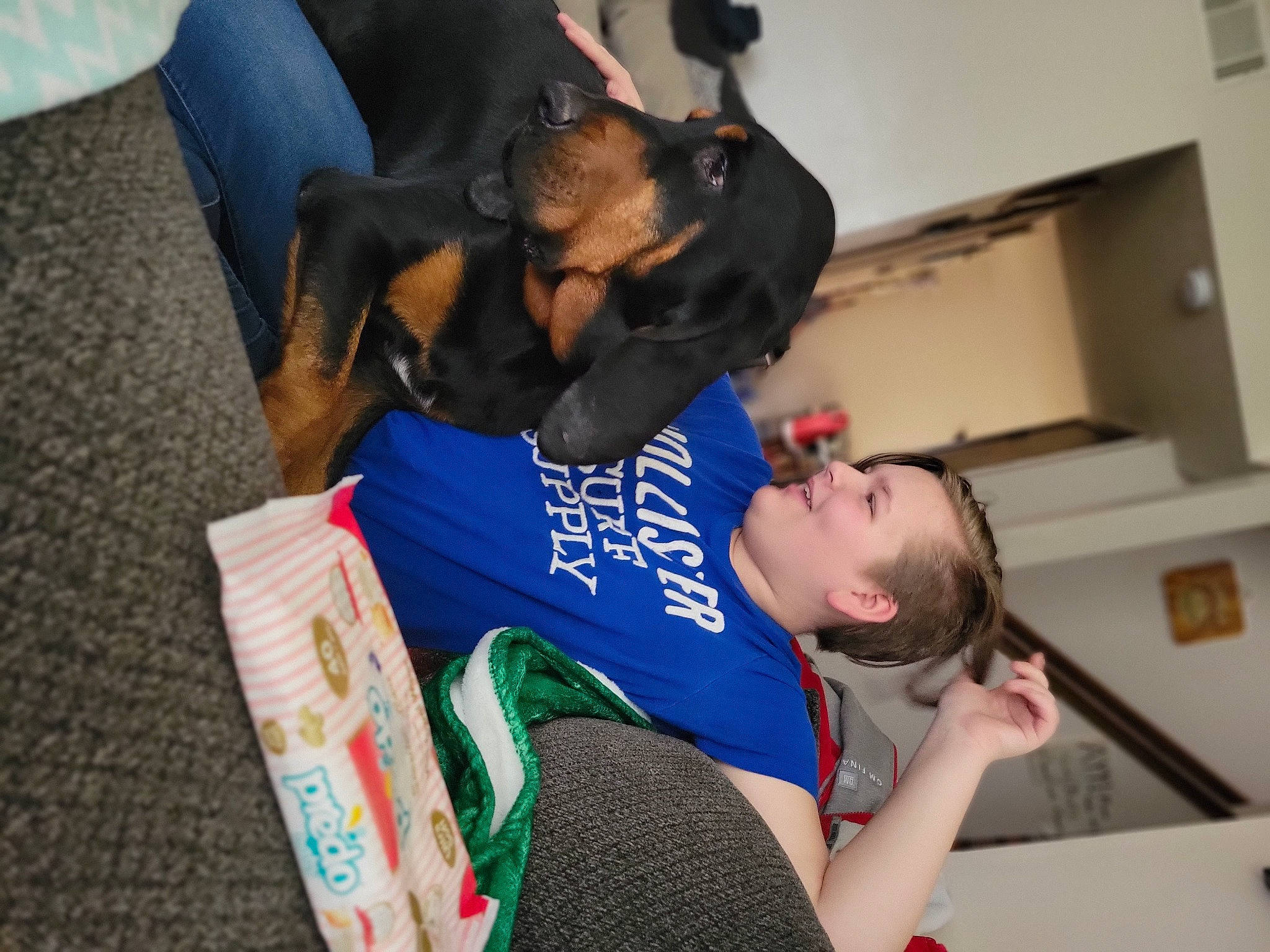 Hank joined the competition — help win amazing prizes! child, comfort, companion_dog, couch, elbow, event, flooring, fun, guard_dog, job, knee, leisure, reading, room, sitting, sportswear, t_shirt, thigh