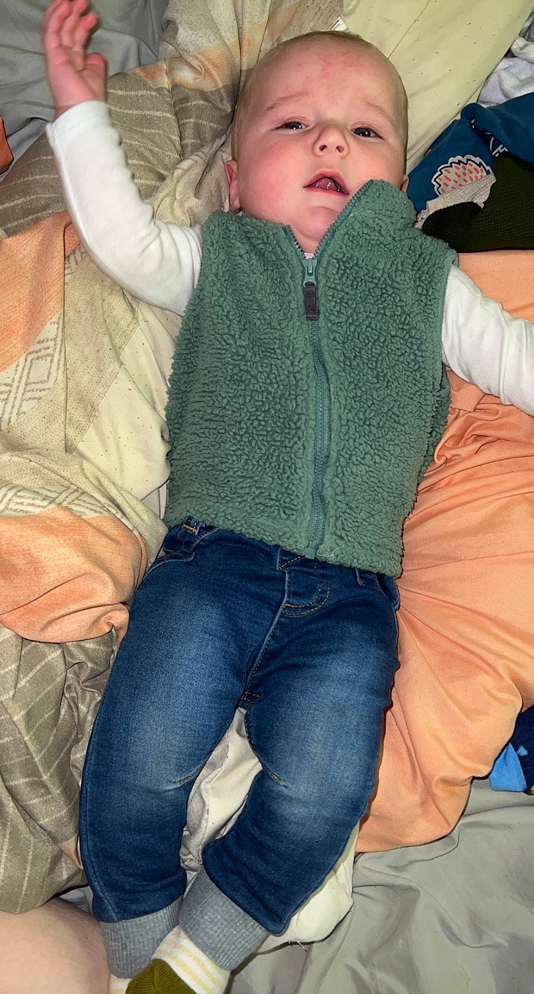 Carter-darrin is registered to the contest to win money with this photo: abdomen, baby, cap, child, comfort, cool, denim, electric_blue, fun, grass, happy, human_leg, jeans, lap, leg, leisure, person, sitting, thigh, toddler