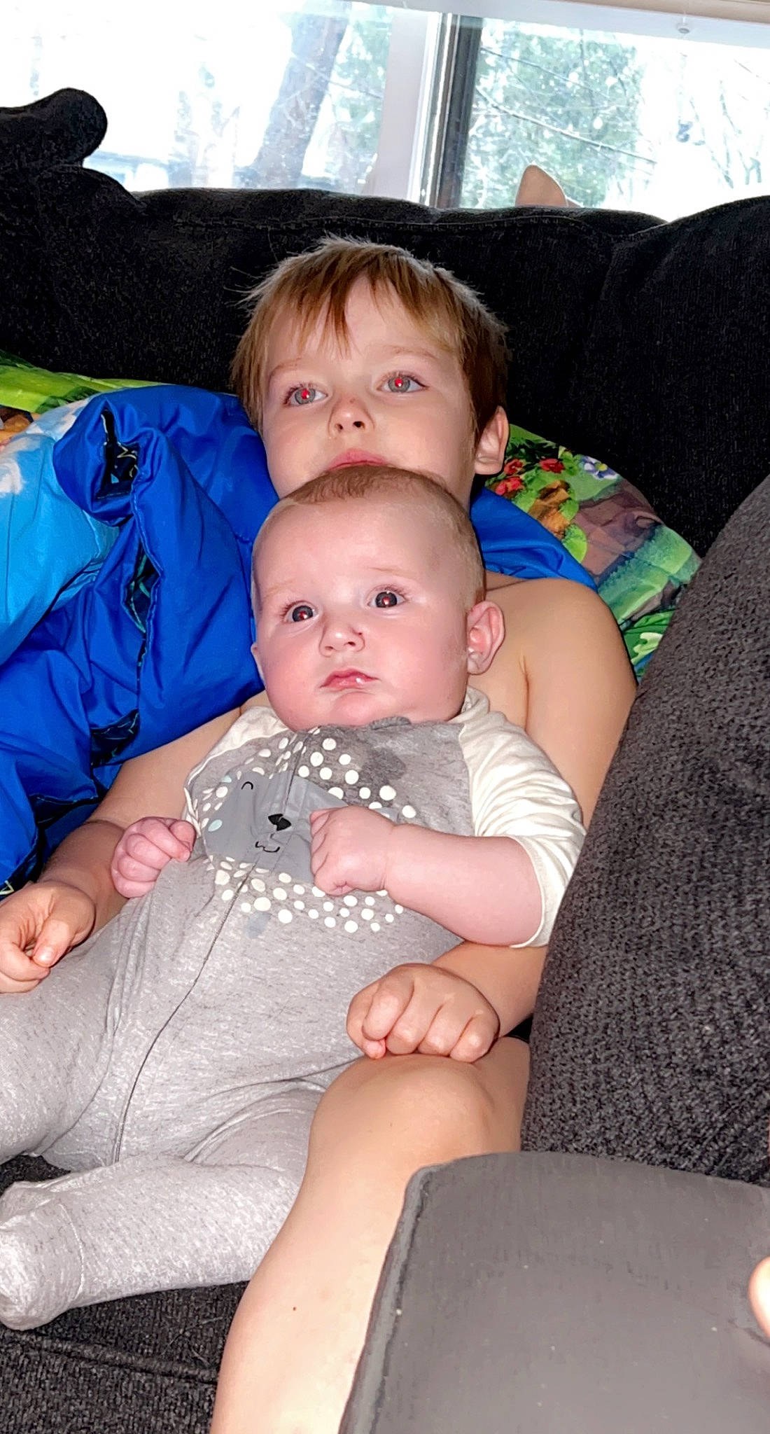 Carter-darrin is registered to the contest to win money with this photo: arm, baby, baby_toddler_clothing, cheek, comfort, couch, fun, hairstyle, happy, interaction, iris, lap, leg, mouth, person, product, skin, textile, thigh, toddler