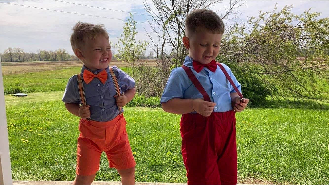 Caleb is registered to the contest to win money with this photo: child, cloud, face, fun, gesture, grass, grassland, happy, joy, leisure, outerwear, people_in_nature, person, plant, prairie, recreation, sky, sleeve, smile, t_shirt