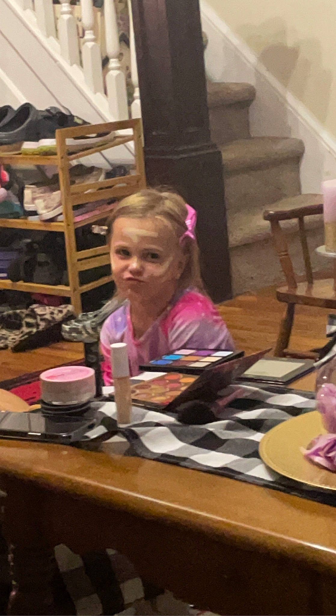 Addison is registered to the contest to win money with this photo: breakfast, chair, child, desk, event, flooring, fun, furniture, mobile_phone, office_supplies, person, plate, room, shelf, sitting, spoon, t_shirt, table, tableware, toddler