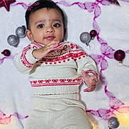 Issa joined the competition — help win amazing prizes! baby, infant, child, knitwear, holiday, christmas, ornaments, lights, blanket, cute, smiling, face, toy, decorations, red, white, brown, plush, socks, cozy