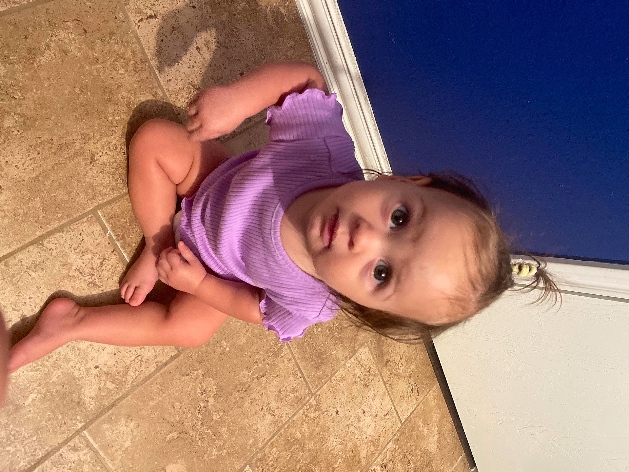 Angelica is registered to the contest to win money with this photo: baby, baby_toddler_clothing, child, chin, finger, flooring, foot, fun, grass, happy, human_body, human_leg, leg, leisure, nose, person, skin, surprise, thigh, toddler