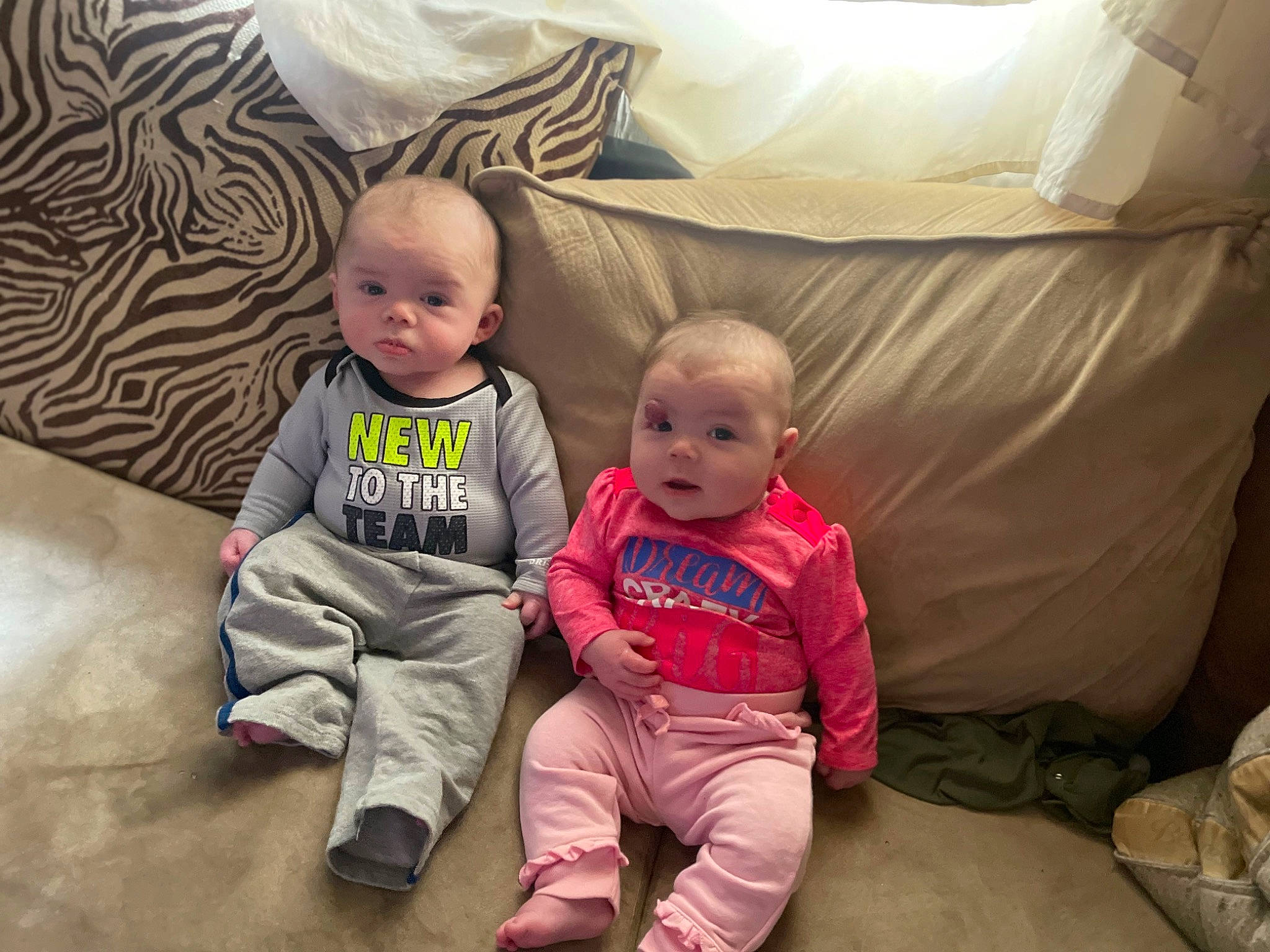 Ariel joined the competition — help win amazing prizes! baby, baby_toddler_clothing, child, comfort, flooring, foot, fun, grass, happy, lap, leg, linens, person, room, sitting, sleeve, t_shirt, throw_pillow, toddler, tree