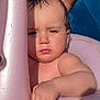 baby, bathing, bathtub, bodypart, clothing, face, finger, hand, head, outdoors, person, photography, pool, portrait, summer, swimmingpool, swimwear, toy, tub, water