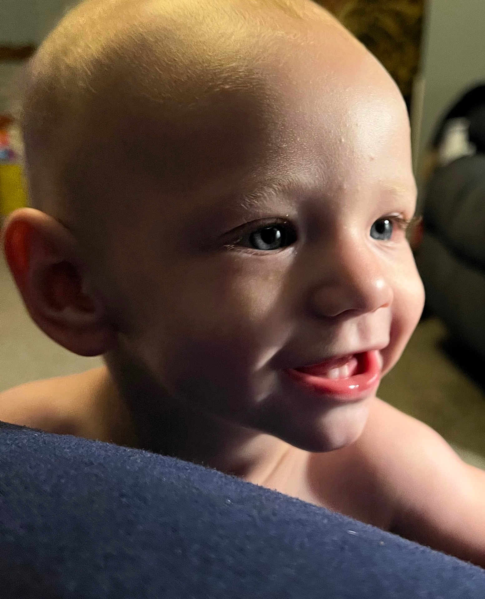 Remmington is registered to the contest to win money with this photo: toddler, child, smile, face, blue_eyes, close_up, indoor, skin, cheek, nose, ear, mouth, teeth, shoulder, expression, happy, person, baby, human, portrait