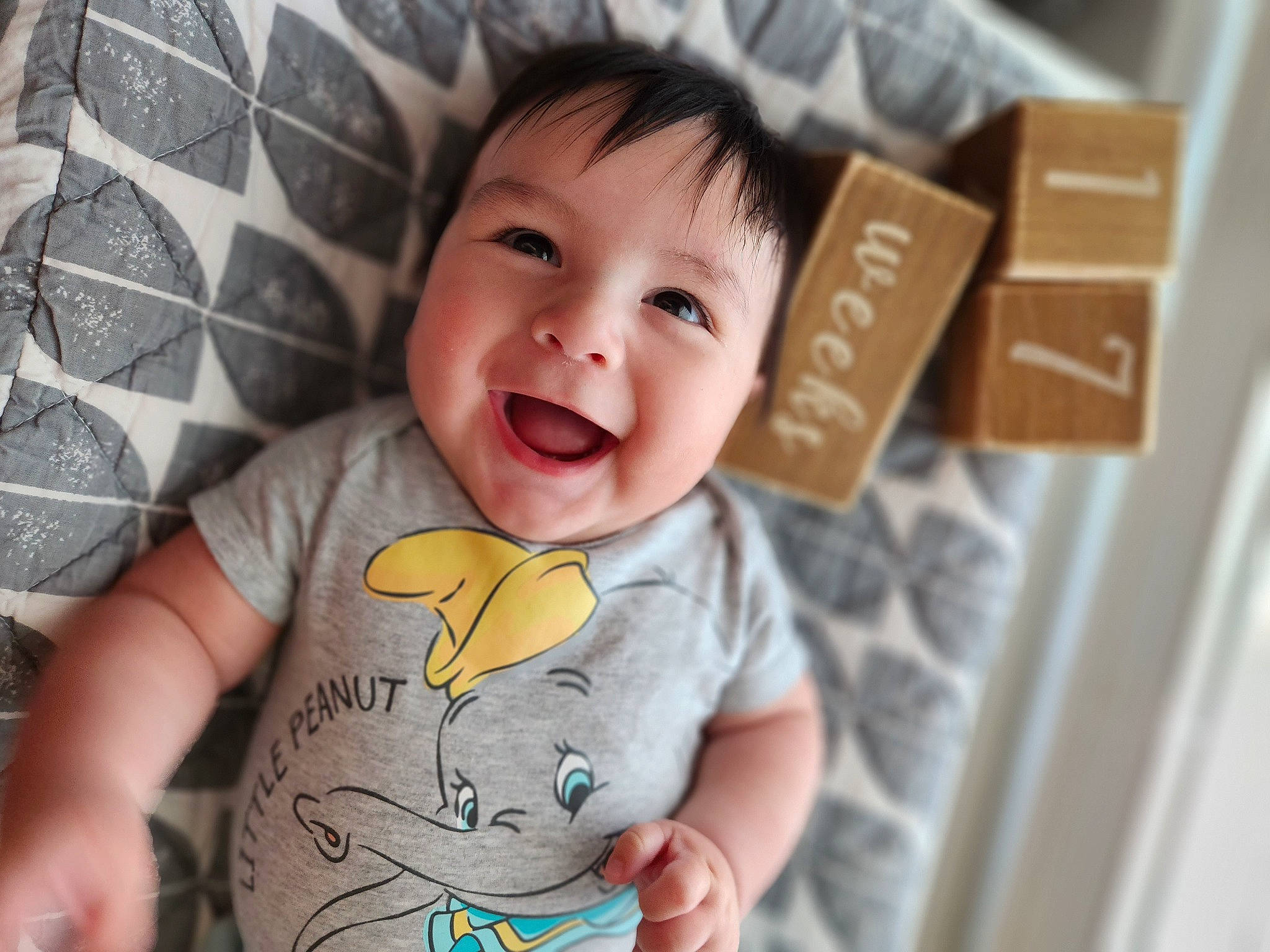 Castiel joined the competition — help win amazing prizes! baby, baby_toddler_clothing, carton, cheek, child, comfort, eye, finger, gesture, hairstyle, happy, head, joy, nose, person, shipping_box, skin, sleeve, smile, t_shirt