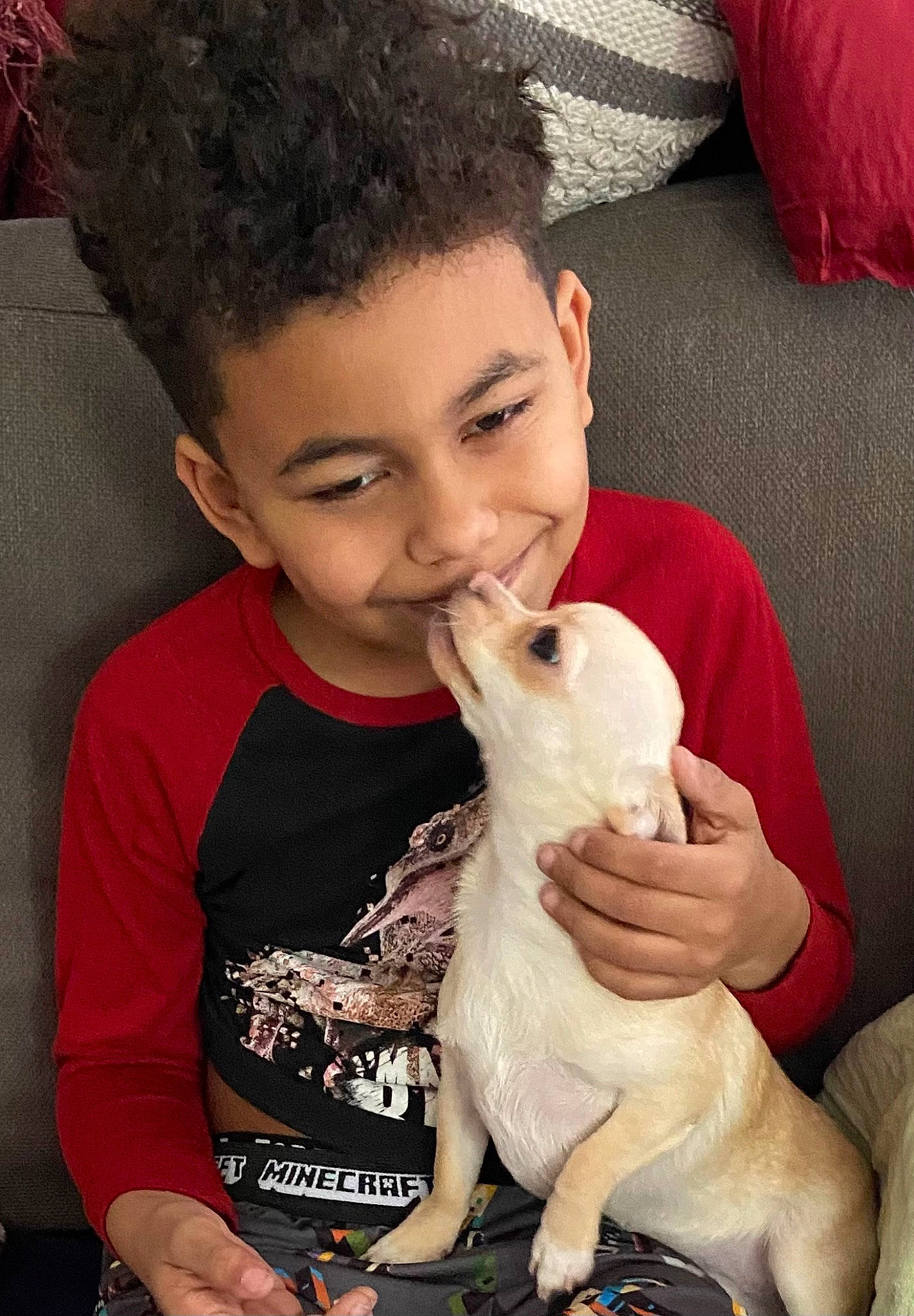 Annie is registered to the contest to win money with this photo: afro, canidae, child, companion_dog, ear, eyelash, fawn, felidae, fur, hand, happy, nail, organ, portrait_photography, rabbit, skin, smile, toddler