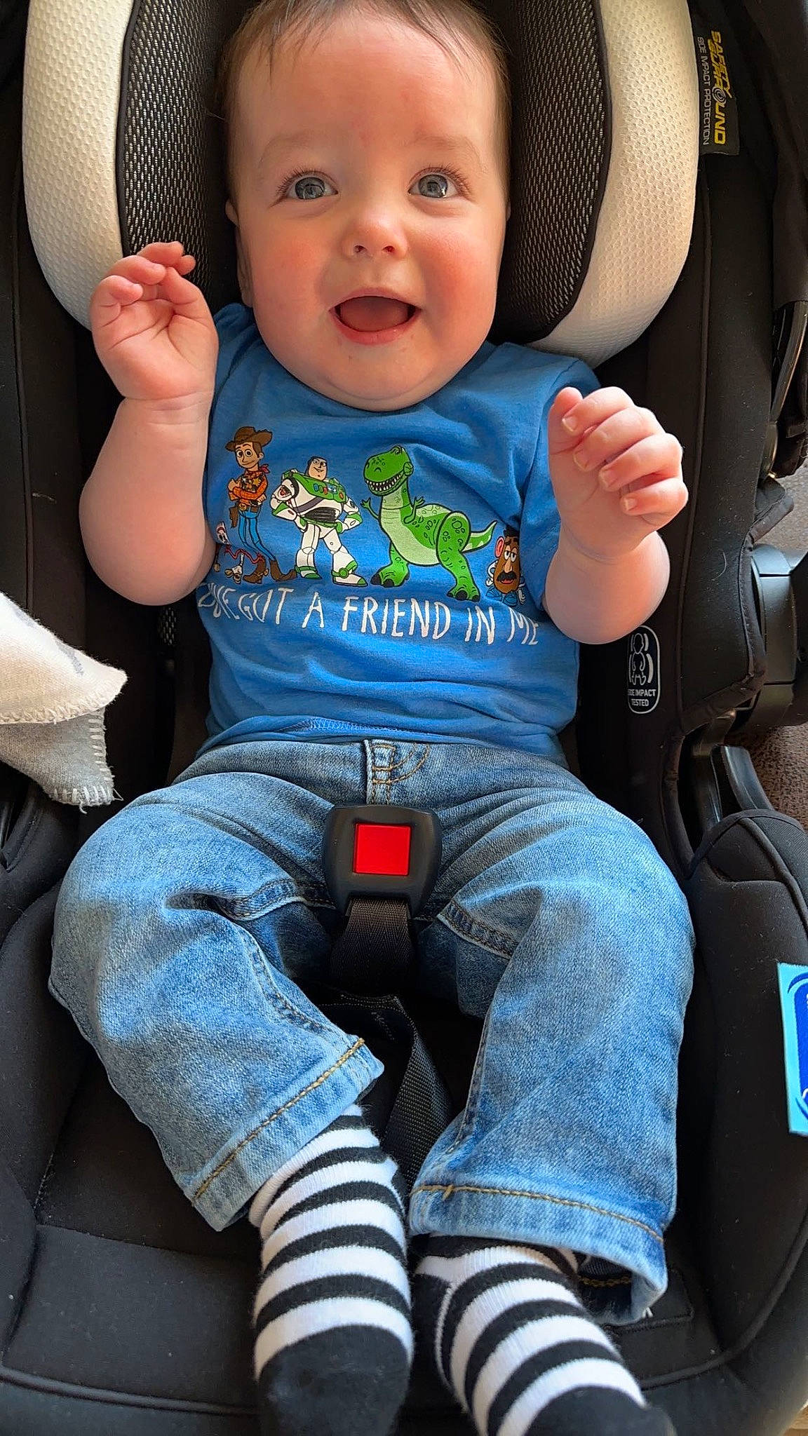 Corbin joined the competition — help win amazing prizes! baby, baby_toddler_clothing, car_seat, cheek, clothing, comfort, cool, facial_expression, finger, green, hand, human, jeans, organ, person, photograph, product, skin, sleeve, smile