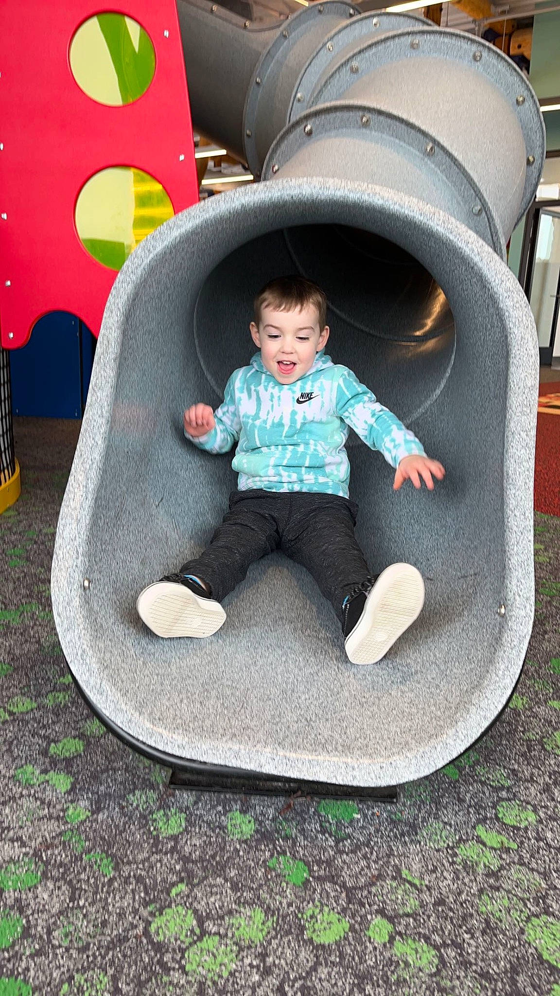 Renly is registered to the contest to win money with this photo: automotive_tire, baby_toddler_clothing, chair, child, city, comfort, fun, gas, grass, leg, leisure, person, plant, product, public_space, recreation, sitting, sneakers, t_shirt, toddler