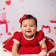 Nayeli joined the competition — help win amazing prizes! baby, red_dress, bow, smile, cupcake, love, rose, heart_pattern, gift_box, valentines, cute, portrait, infant, happy, celebration, white_background, soft_texture, holiday, child, festive