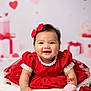 baby, red_dress, bow, smile, cupcake, love, rose, heart_pattern, gift_box, valentines, cute, portrait, infant, happy, celebration, white_background, soft_texture, holiday, child, festive