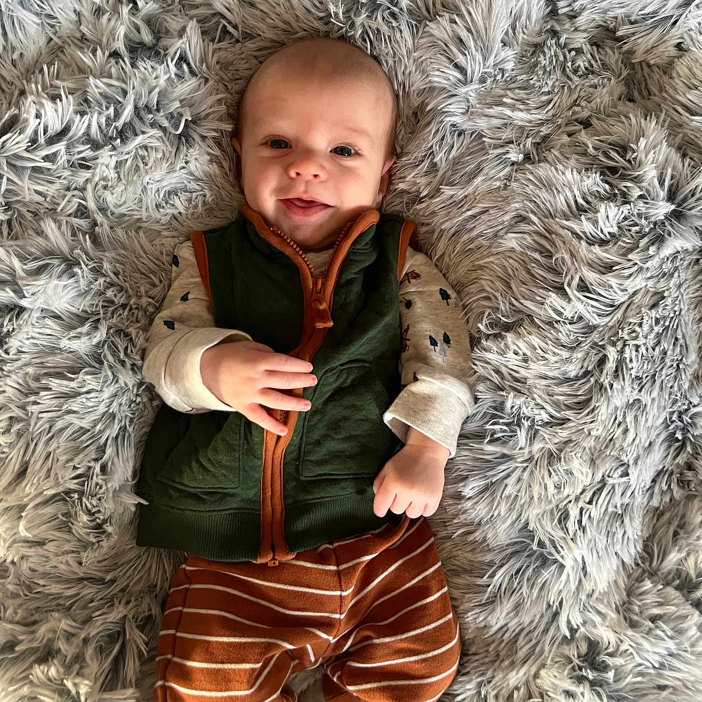 Axton joined the competition — help win amazing prizes! baby, blanket, bodypart, clothing, coat, face, finger, hand, happy, head, homedecor, jacket, knitwear, pants, person, photography, portrait, shorts, smile, sweater