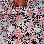 Amiliana is registered to the contest to win money with this photo: baby, bed, blanket, clothing, crib, face, furniture, glove, head, homedecor, infantbed, newborn, pajamas, pattern, person, photography, portrait, quilt, sleeping