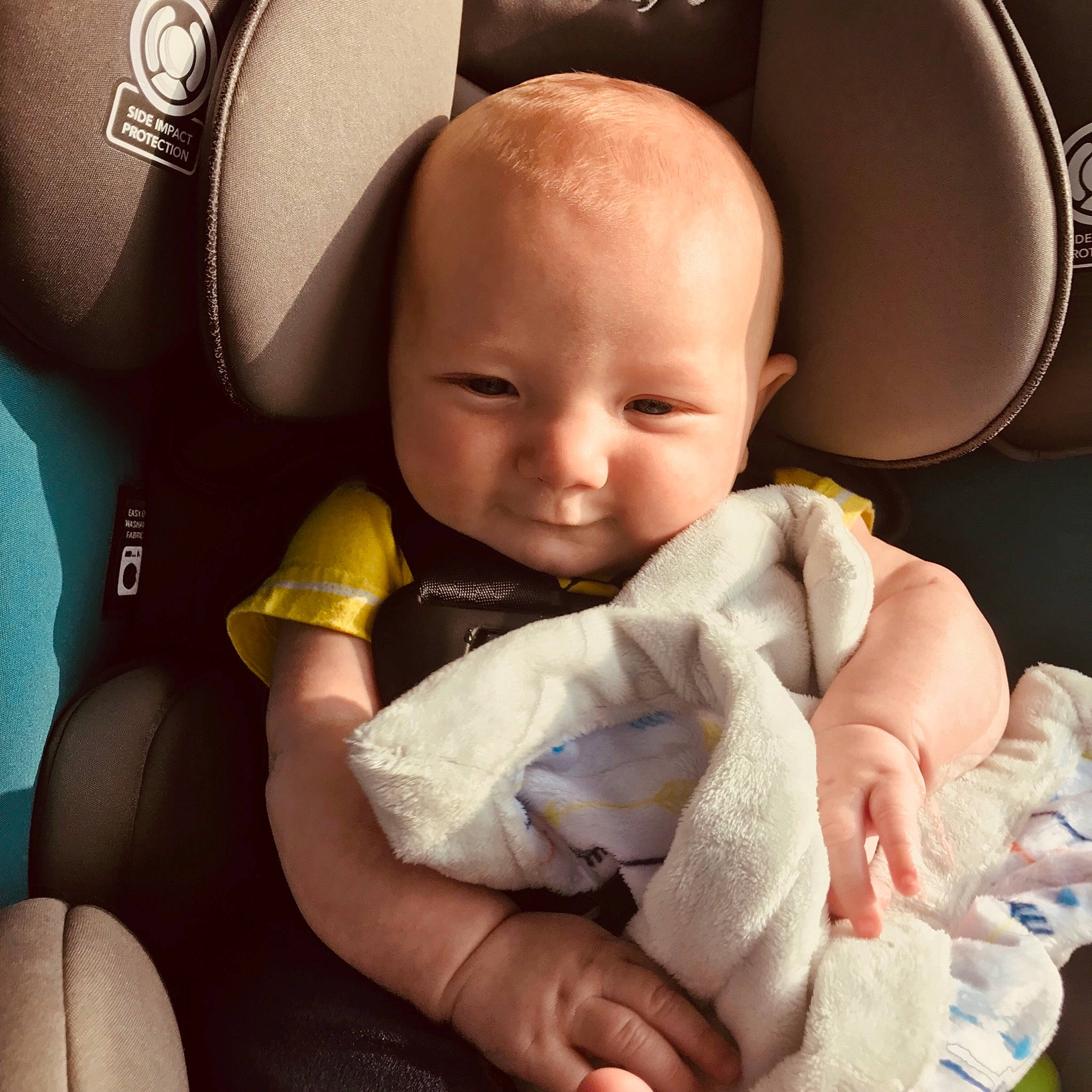 Tyler is registered to the contest to win money with this photo: baby, baby_in_car_seat, baby_products, birth, car_seat, cheek, child, comfort, finger, hand, person, product, skin, toddler