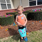 Jeston joined the competition — help win amazing prizes! child, boy, outdoor, grass, bushes, easter_eggs, bucket, bunny, tank_top, slippers, spring, holiday, playing, happy, daylight, window, house, brick_wall, hedge, fun