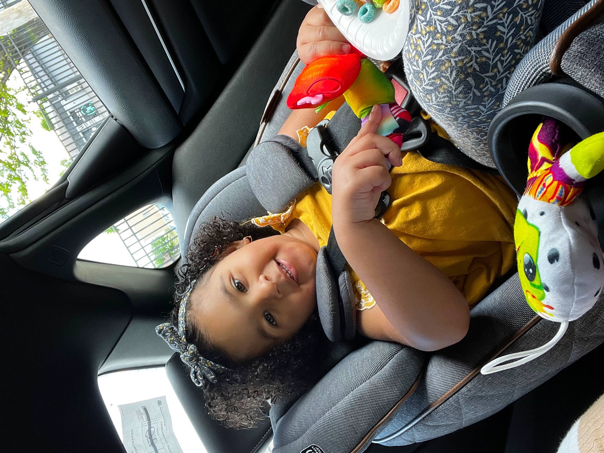 Mariah joined the competition — help win amazing prizes! auto_part, automotive_design, automotive_exterior, car, car_seat, car_seat_cover, child, family_car, fun, happy, human_leg, joy, leisure, motor_vehicle, person, shoe, sneakers, steering_wheel, toddler, toy