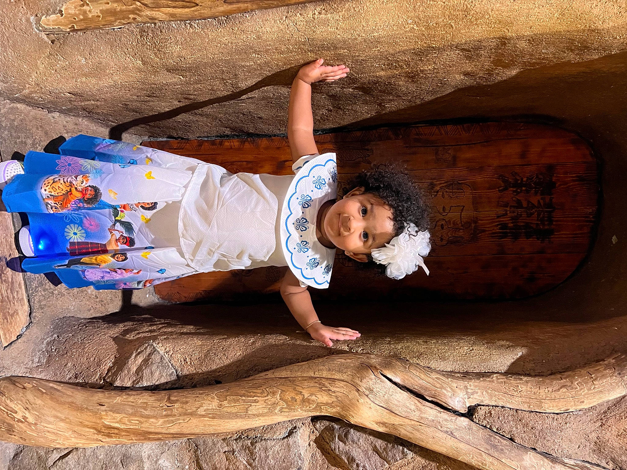 Mariah is registered to the contest to win money with this photo: baby, child, fun, geology, happy, headwear, joy, landscape, leisure, person, rock, sand, shadow, sitting, soil, t_shirt, toddler, tourism, tree, vacation