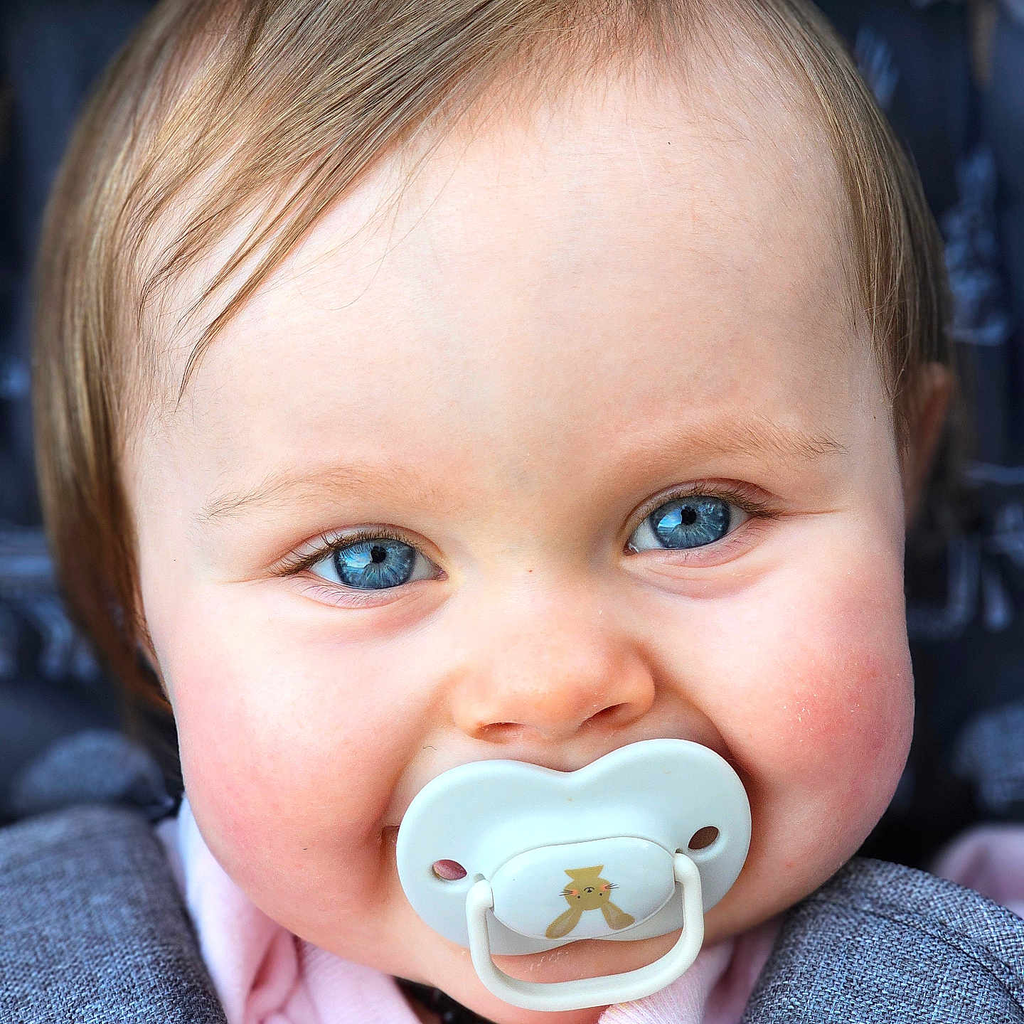 Indigo joined the competition — help win amazing prizes! adorable, baby, blue_eyes, child, close_up, clothing, cute, expression, face, gray, hair, infant, pacifier, person, pink, portrait, skin, smile, warm, young