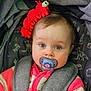 Indigo joined the competition — help win amazing prizes! baby, baby_girl, blue_eyes, car_seat, caterpillar_toy, child, closeup, cute, face, gray_straps, headrest, indoors, infant, pacifier, pink_clothing, portrait, red_toy, soft_lighting, striped_outfit, young_child