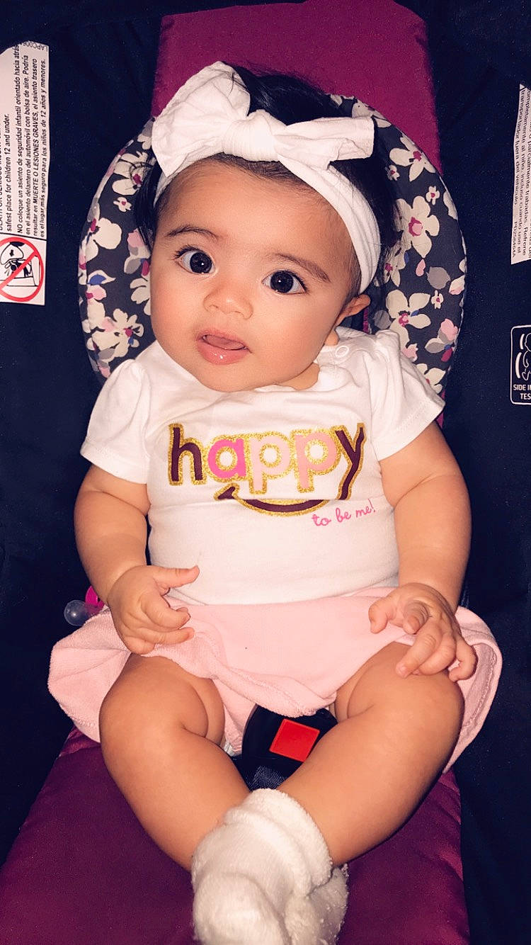 Esmeralda joined the competition — help win amazing prizes! baby, baby_products, baby_toddler_clothing, cheek, child, headgear, person, pink, product, sitting, skin, sleeve, toddler