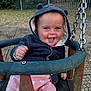 baby, child, swing, playground, hooded_jacket, blue_eyes, smiling, happy, outdoor, grass, metal_chain, rust, pink_pants, animal_print, fist, seat, person, infant, cute, joyful