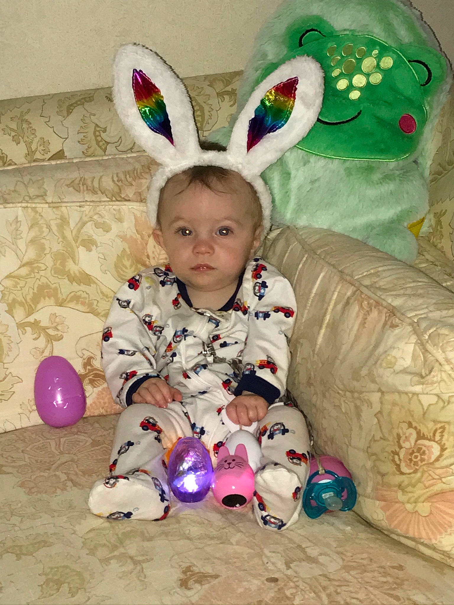 Oaklee is registered to the contest to win money with this photo: baby, baby_toddler_clothing, balloon, child, easter, easter_bunny, event, fun, happy, head, holiday, magenta, mammal, party_supply, pattern, person, pink, play, sitting, toddler