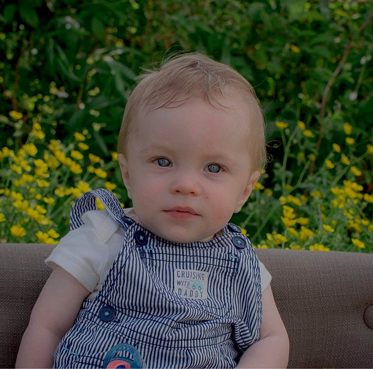 Oaklee joined the competition — help win amazing prizes! baby, baby_toddler_clothing, blond, cheek, child, electric_blue, eye, flowering_plant, grass, happy, iris, pattern, people_in_nature, person, plant, sitting, skin, sleeve, t_shirt, toddler