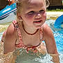 Evelyn joined the competition — help win amazing prizes! child, water, pool, splashing, smiling, swimsuit, summer, outdoor, happy, playing, wet, sunlight, necklace, earrings, inflatable, backyard, fun, cute, girl, daytime