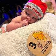 Emeri joined the competition — help win amazing prizes! baby, infant, blanket, hat, christmas, holiday, milestone, winnie_the_pooh, piglet, red_hat, white_blanket, cute, child, portrait, indoors, soft_texture, sucking_fingers, newborn, 3_months, holiday_season