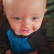 Able joined the competition — help win amazing prizes! baby, child, face, blue_eyes, smile, food_smear, clothing, arm, hand, person, indoor, closeup, cute, young_child, skin, expression, portrait, infant, sitting, casual