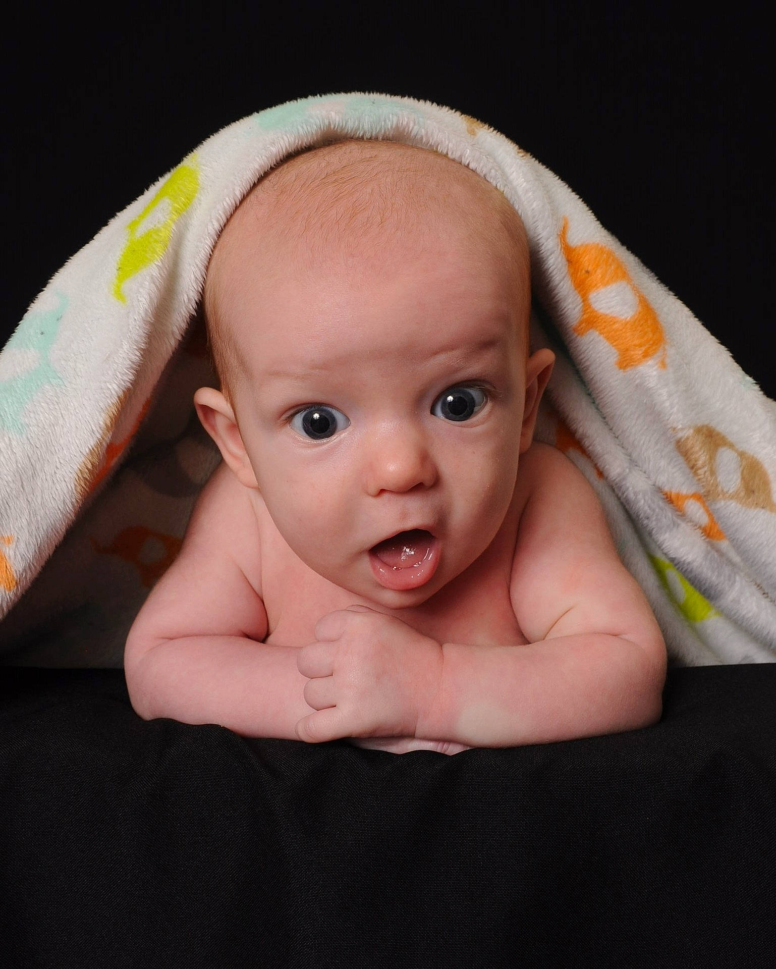 Lucas is registered to the contest to win money with this photo: cheek, child, ear, eye, face, finger, hand, head, infant, mouth, nose, person, skin, smile, surprise, toddler