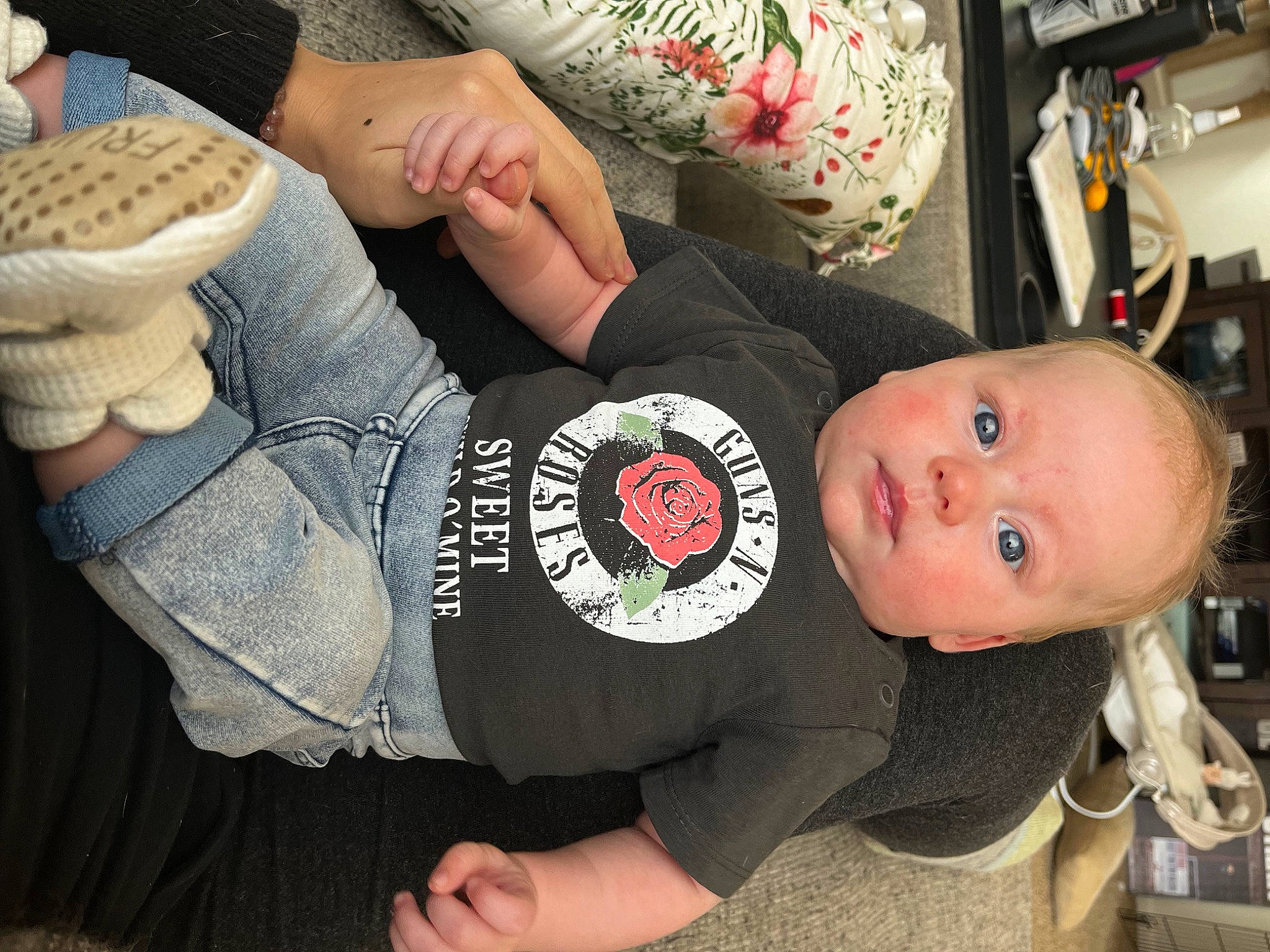 Lillian is registered to the contest to win money with this photo: baby, baby_toddler_clothing, child, comfort, elbow, finger, fun, gesture, hand, human_leg, knee, nail, pattern, person, sitting, sleeve, t_shirt, thigh, thumb, toddler