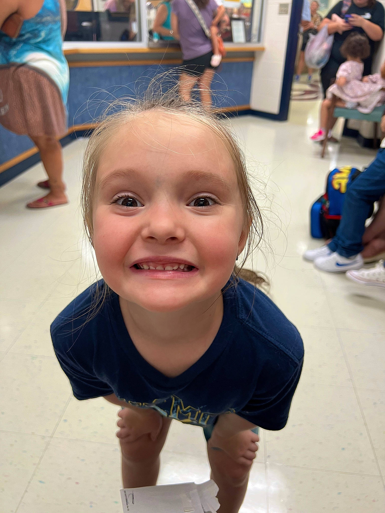 Luna is registered to the contest to win money with this photo: arm, blue, chair, cheek, child, event, eyelash, floor, flooring, fun, happy, iris, joint, joy, leisure, person, recreation, skin, smile, summer