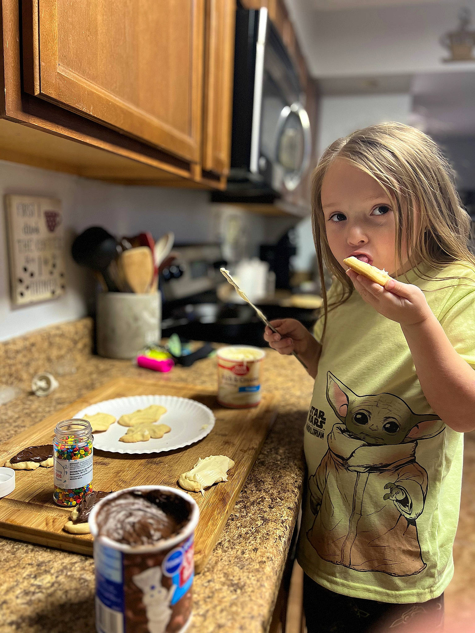 Luna is registered to the contest to win money with this photo: cabinetry, comfort_food, cooking, countertop, cuisine, dish, food, home_appliance, homemaker, kitchen, kitchen_appliance, kitchen_stove, paint, person, plate, recipe, refrigerator, room, table, tableware