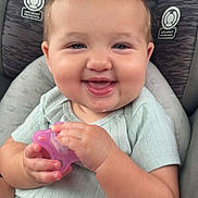 Winry joined the competition — help win amazing prizes! baby, car_interior, car_seat, child, clothing, comfort, cute, face, happy, infant, person, playful, portrait, seat, seat_belt, short_sleeves, skin, small_hands, smiling, toy