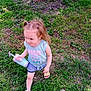 Kingslee is registered to the contest to win money with this photo: child, toddler, grass, outdoor, summer_clothing, sippy_cup, sandals, pigtails, greenery, playful, walking, casual_wear, sunny, nature, small_footwear, flower_decor, person, young_child, vacation, daylight