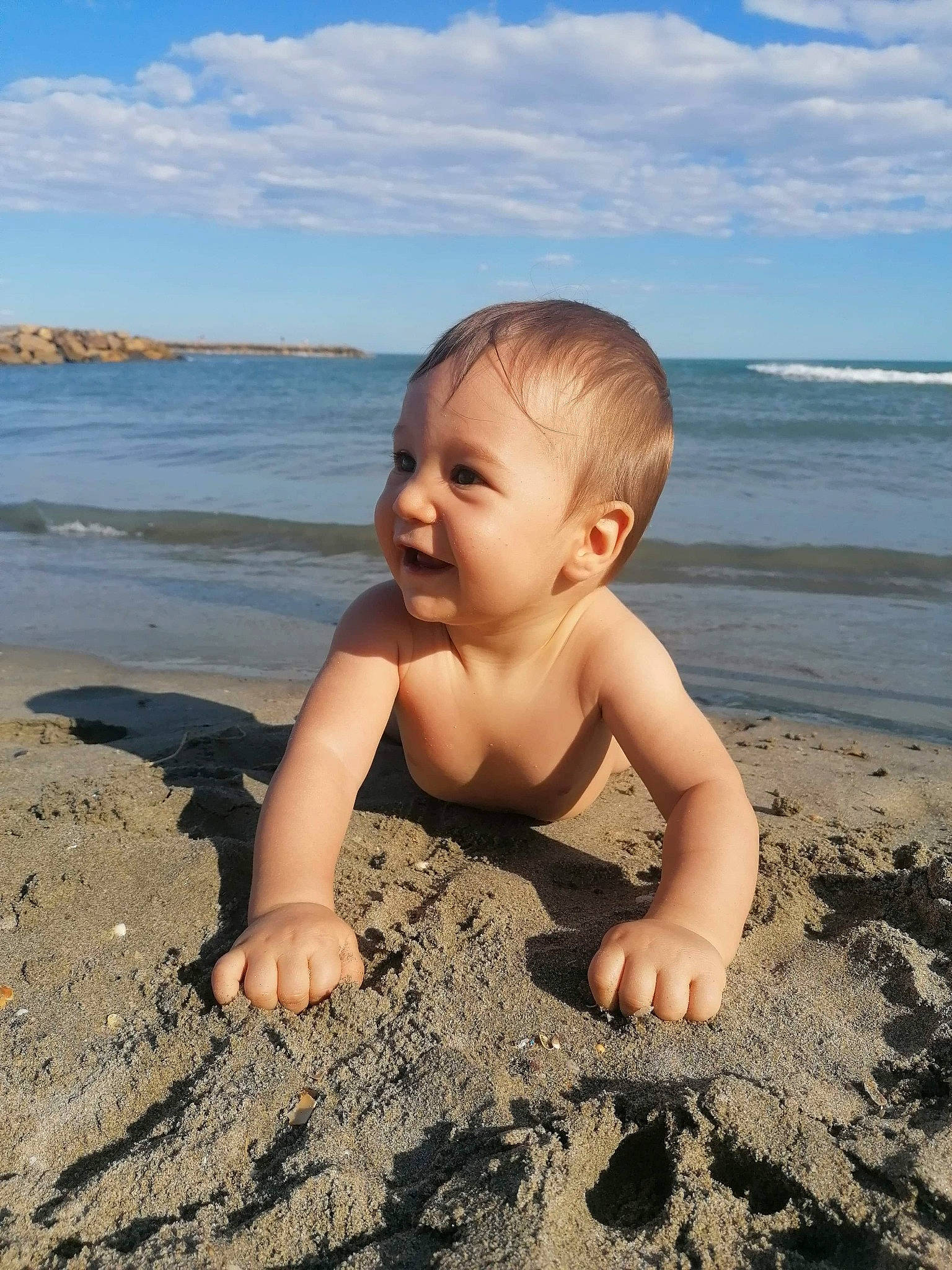 Aaron T participe au concours pour gagner de l'argent avec cette photo : baby, beach, child, coast, fun, leg, ocean, person, play, sand, sea, sky, smile, summer, toddler, vacation, wave