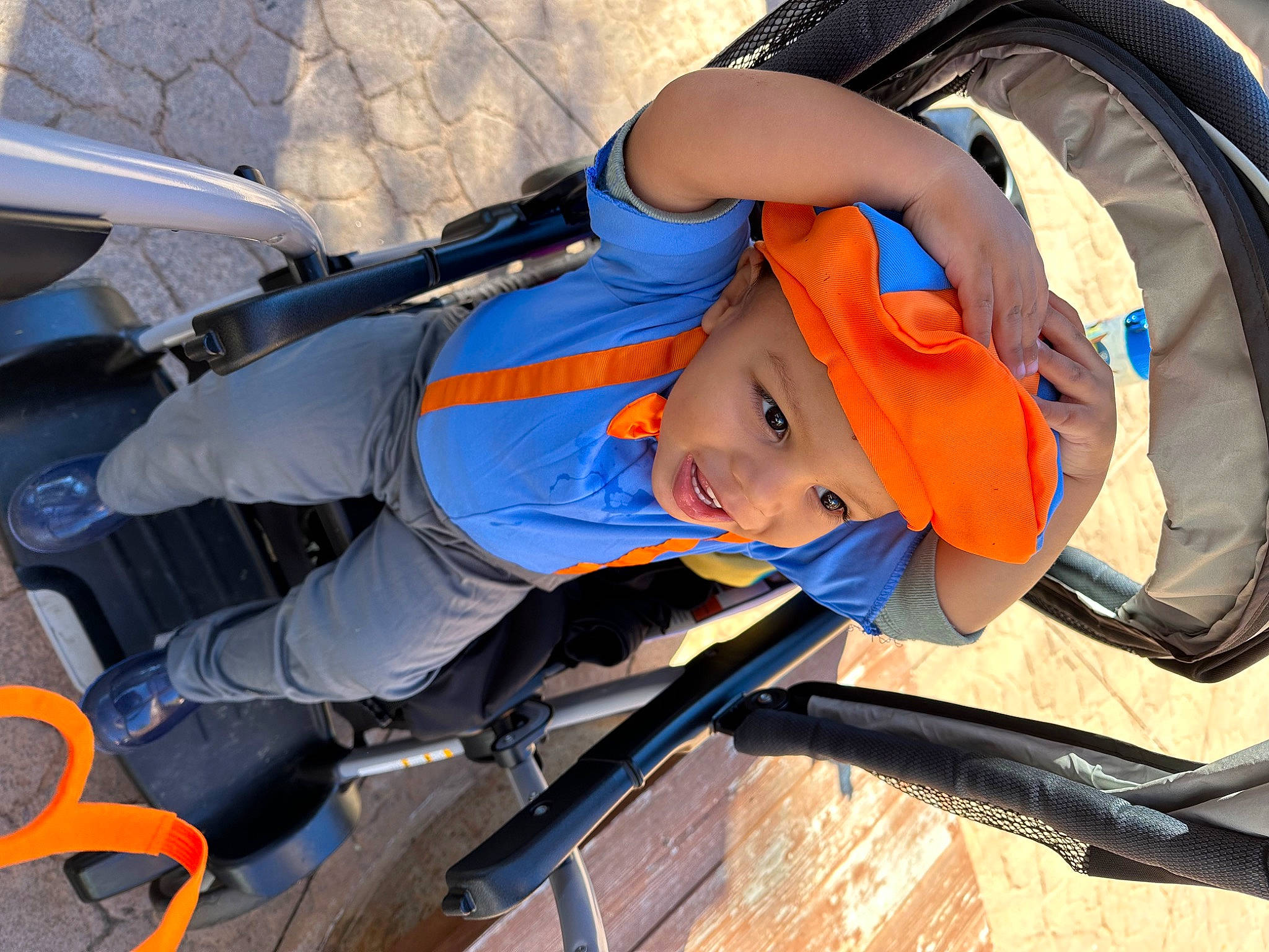 Ezra joined the competition — help win amazing prizes! auto_part, automotive_exterior, automotive_lighting, baby, baby_carriage, baby_products, child, electric_blue, fashion_accessory, fun, hat, headwear, leisure, motor_vehicle, orange, person, personal_protective_equipment, recreation, toddler, travel