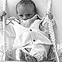 Léo a rejoint le concours — aidez-le/la à gagner de superbes lots ! baby, bare_foot, black_and_white, buttons, child, closeup, cozy, eyes, face, hands, infant, jacket, knit, monochrome, pacifier, portrait, rope, swing, toes, wooden_plank