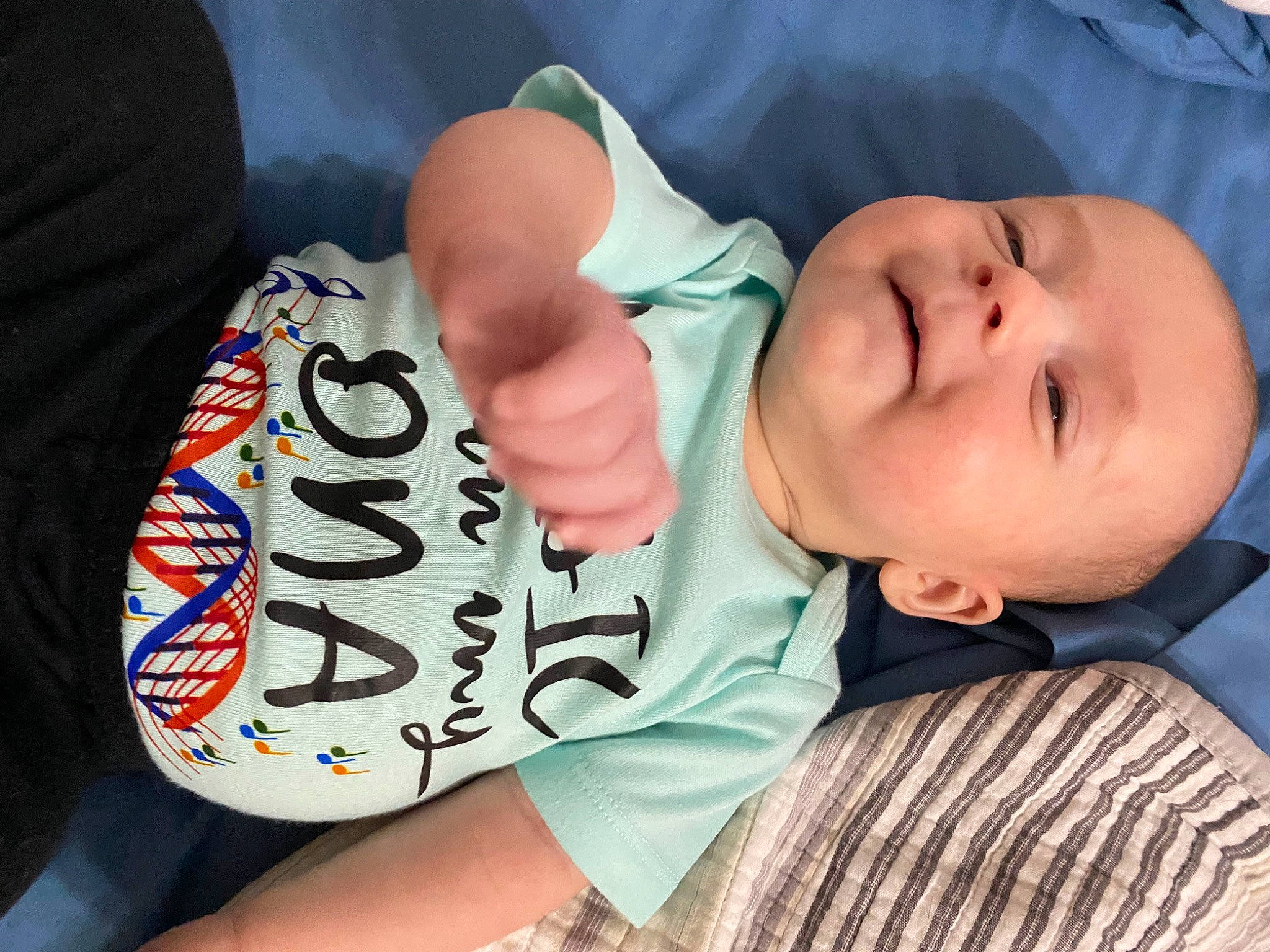 Brynlee is registered to the contest to win money with this photo: arm, baby, baby_toddler_clothing, cheek, comfort, elbow, eye, eyelash, finger, gesture, human_body, human_leg, mouth, nail, nose, person, sleeve, thigh, thumb, toddler