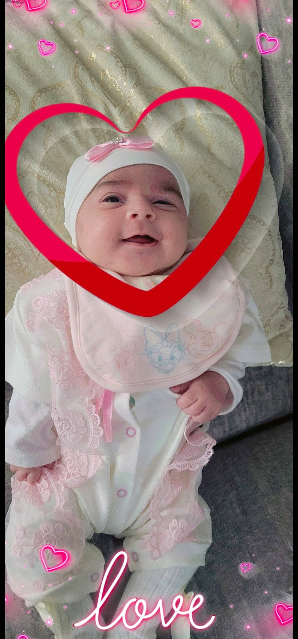 Rahma is registered to the contest to win money with this photo: baby, baby_products, baby_toddler_clothing, cheek, child, comfort, eye, face, fashion_accessory, fun, grass, happy, headwear, linens, magenta, peach, person, pink, portrait_photography, sleeve