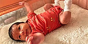 Lysandra is registered to the contest to win money with this photo: baby, baby_garment, cherry_pattern, child, curious_expression, cute, fluffy_blanket, indoor, infant, infant_care, lying_down, mesh_sides, newborn, onesie, orange_clothing, playpen, reaching_hand, small_arms, soft_texture, white_socks