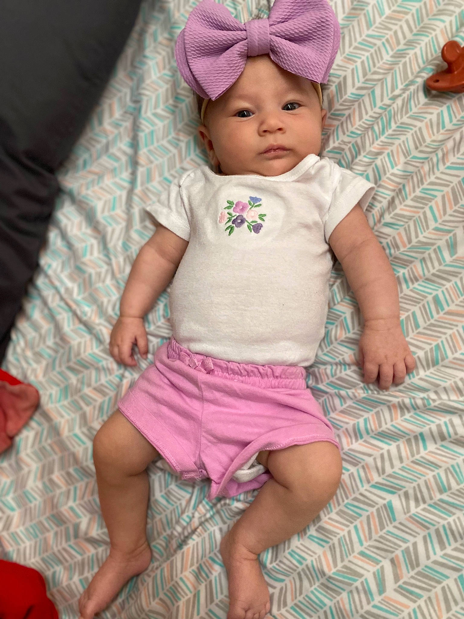 Maiyah joined the competition — help win amazing prizes! baby, baby_toddler_clothing, barefoot, cap, child, comfort, foot, hand, happy, headwear, human_leg, linens, magenta, pattern, person, pink, purple, skin, sleeve, textile