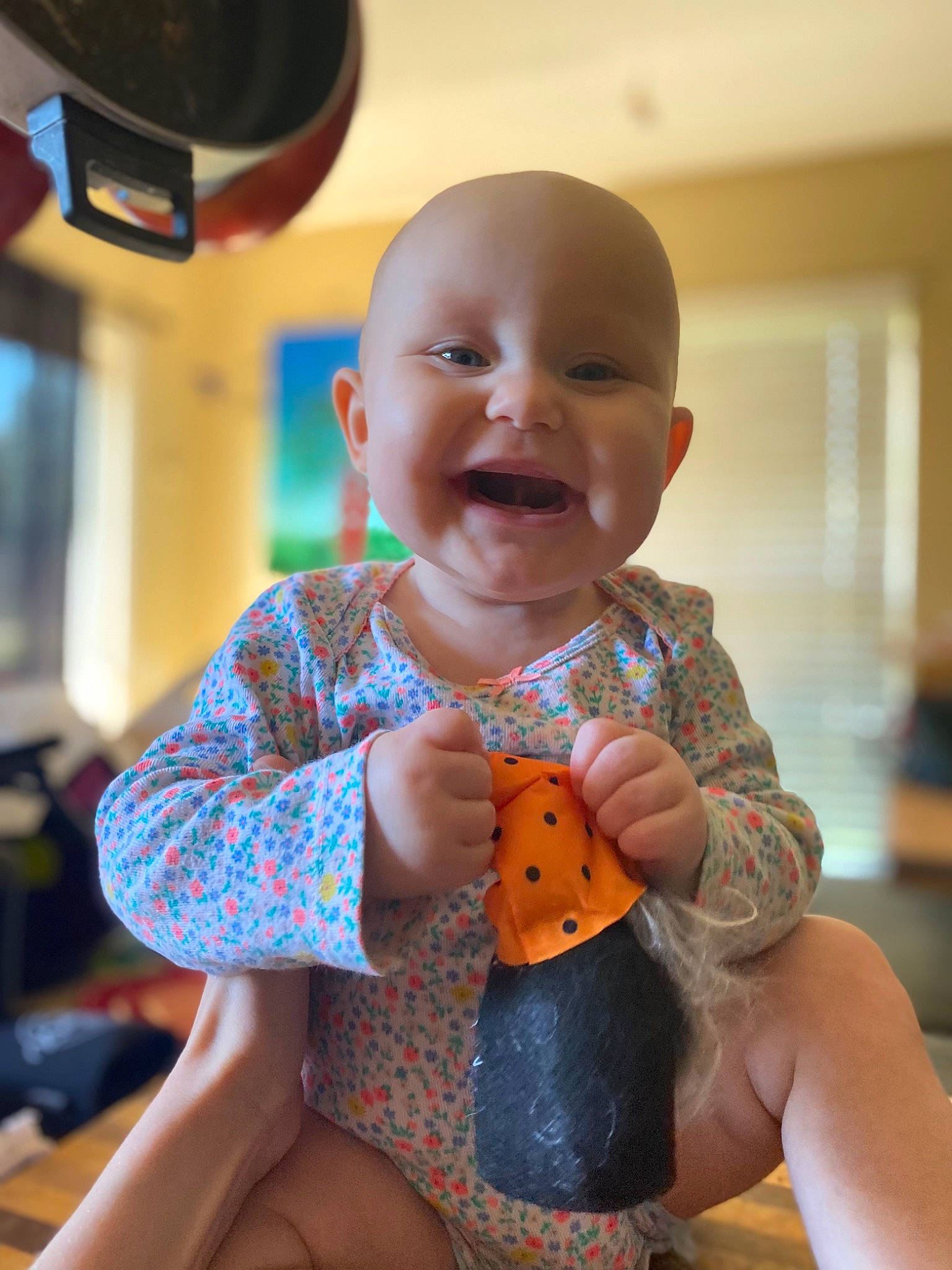 Urza is registered to the contest to win money with this photo: baby, baby_toddler_clothing, cheek, child, facial_expression, foot, fun, happy, human_leg, iris, nail, pattern, person, sitting, skin, smile, standing, thigh, thumb, toddler