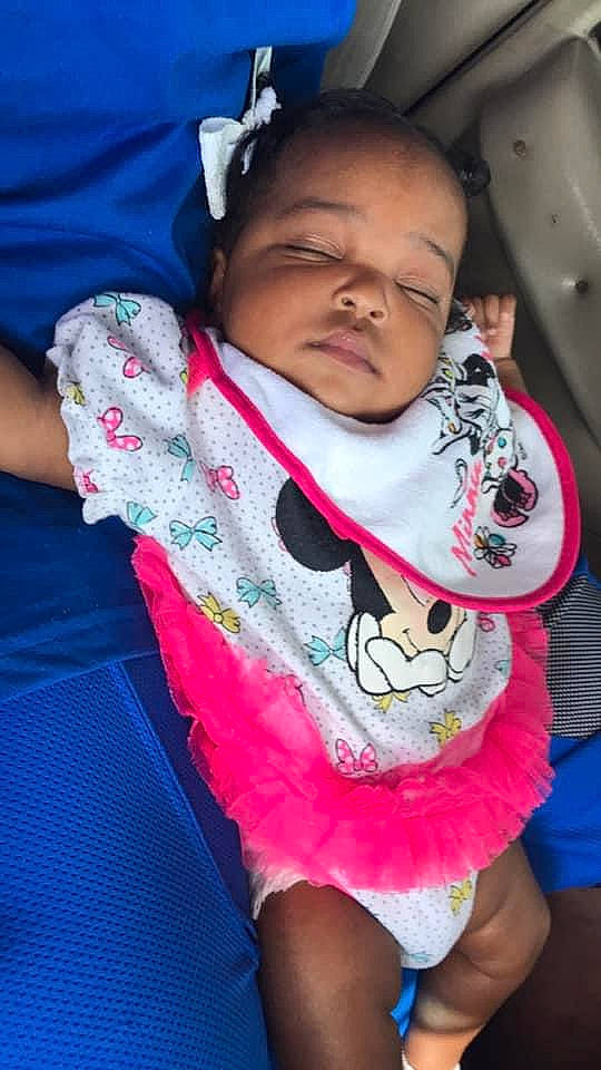 Jaziah is registered to the contest to win money with this photo: baby, baby_products, baby_toddler_clothing, cheek, cool, hood, hoodie, person, pink, stuffed_toy, thigh