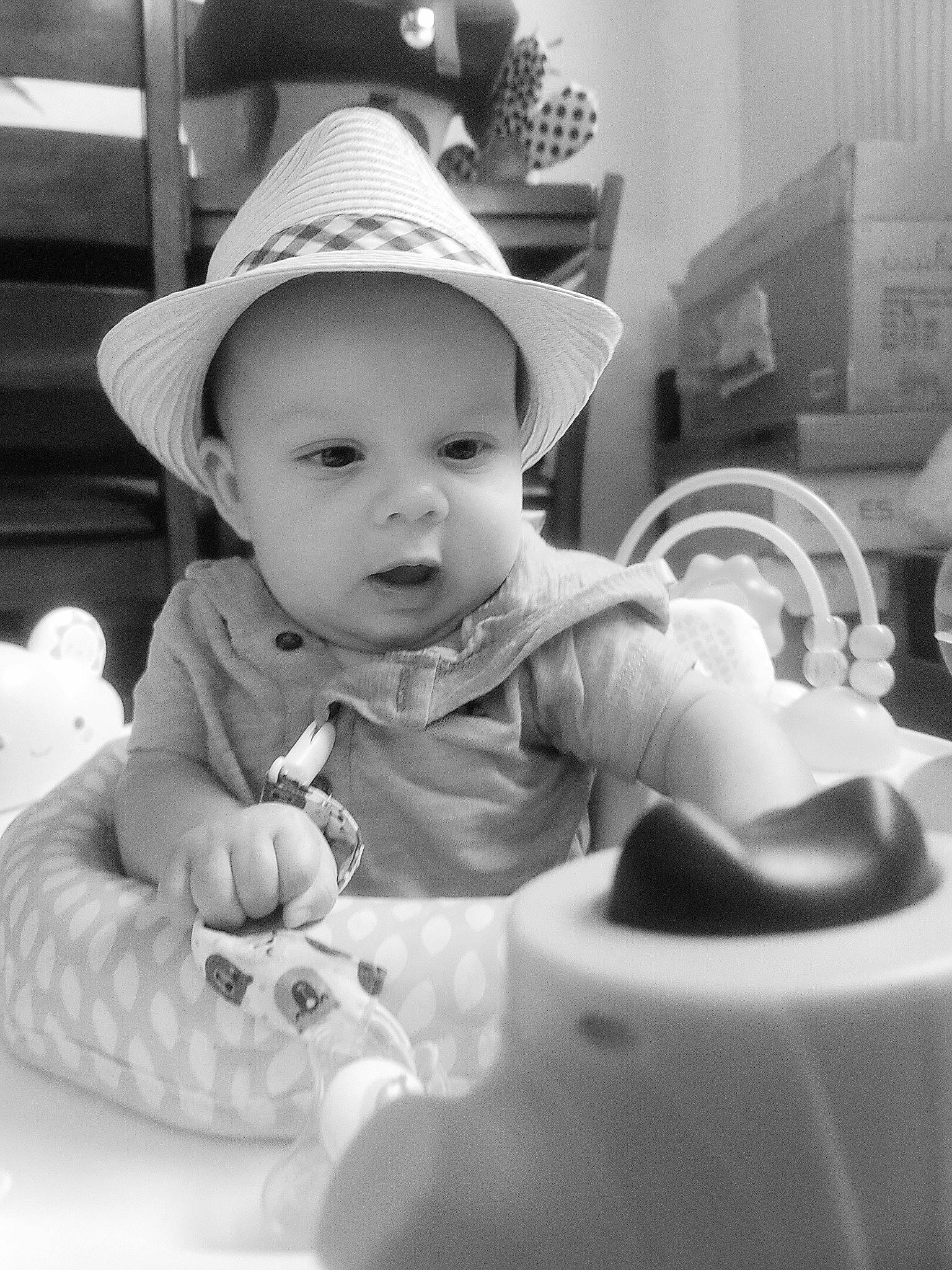 Kanen is registered to the contest to win money with this photo: baby, black, black_and_white, cheek, fedora, flash_photography, fun, happy, hat, headgear, iris, monochrome, monochrome_photography, person, photograph, smile, snapshot, style, sun_hat, toddler