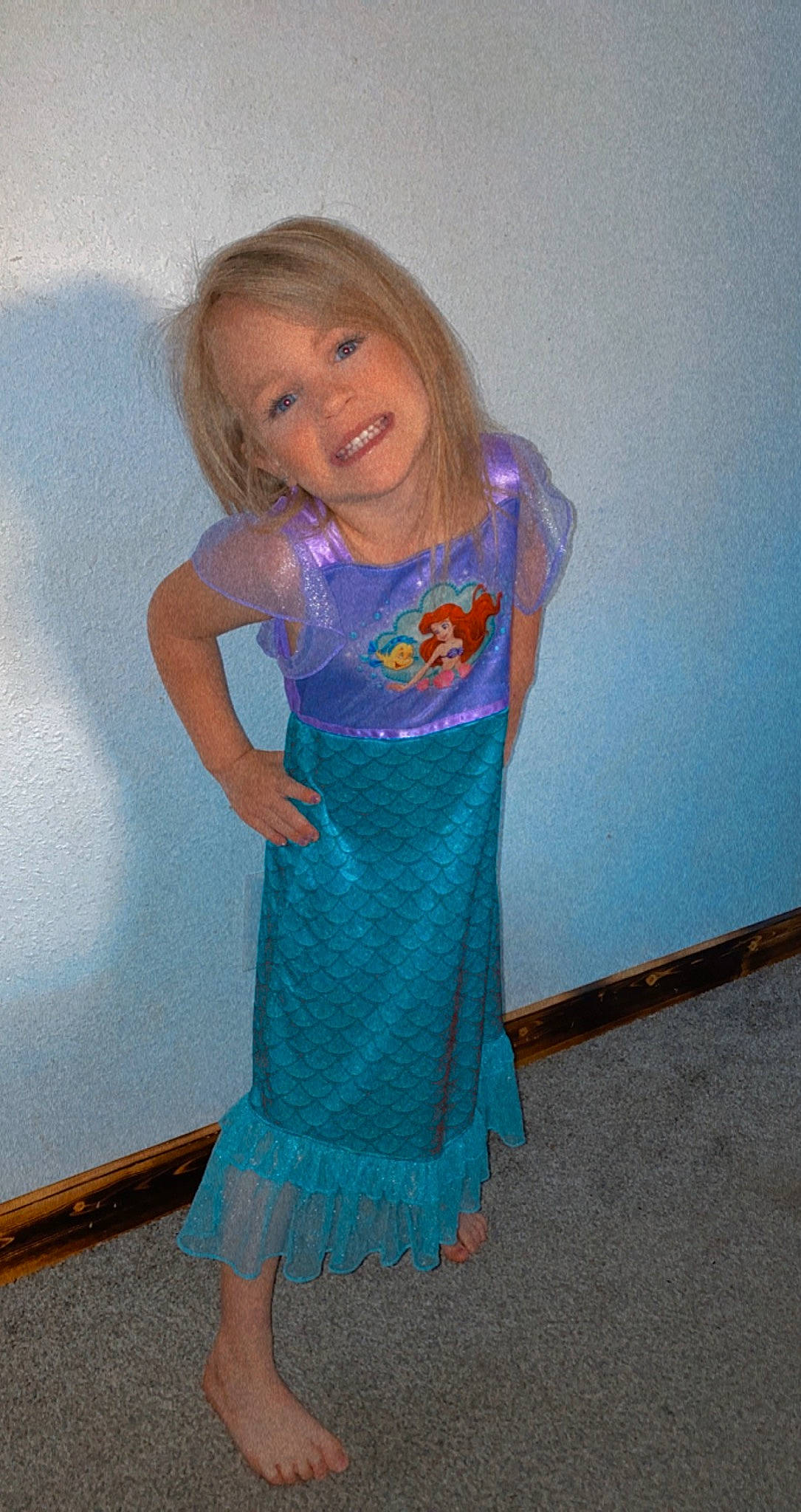 Sailor is registered to the contest to win money with this photo: arm, baby_toddler_clothing, day_dress, dress, electric_blue, fashion_design, hair, happy, joy, long_hair, neck, one_piece_garment, outerwear, pattern, person, shoulder, sleeve, smile, standing, textile