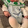 Rayleigh is registered to the contest to win money with this photo: baby, infant, sleeping, blue_gingham, clothing, blanket, soft_texture, hand, legs, white_tights, child, cute, cozy, resting, portrait, indoors, comfort, toddler, peaceful, close_up