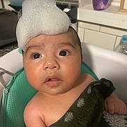 Owen joined the competition — help win amazing prizes! baby, child, bath, bubbles, foam, towel, bathroom, sink, face, curious, skin, water, seat, expression, indoors, head, clean, cute, infant, person